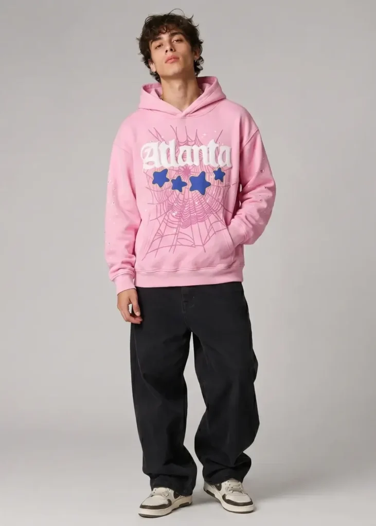 Man wearing the pink Spider Atlanta hoodie