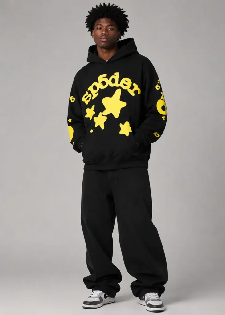 Man wearing the Beluga hoodie in onyx and yellow